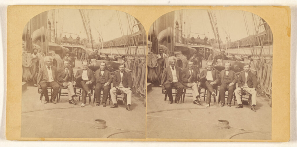 Frederick Douglass seated with the Commissioners to Santo Domingo in Brooklyn Navy Yard