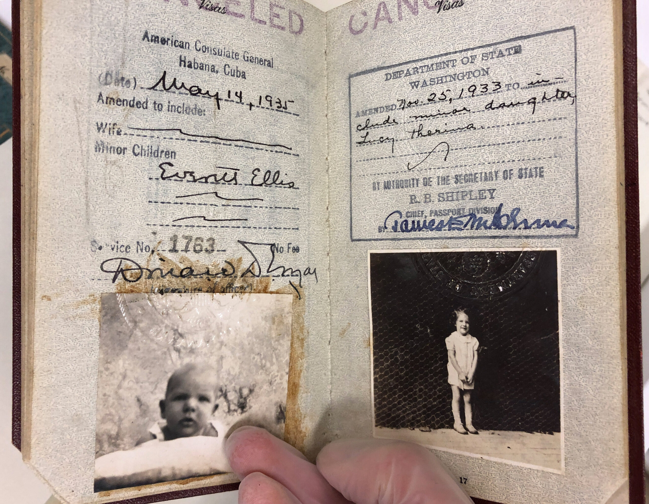 The pages in the passport that include appended photos of Ellis and Lucy’s son (left) and daughter (right).