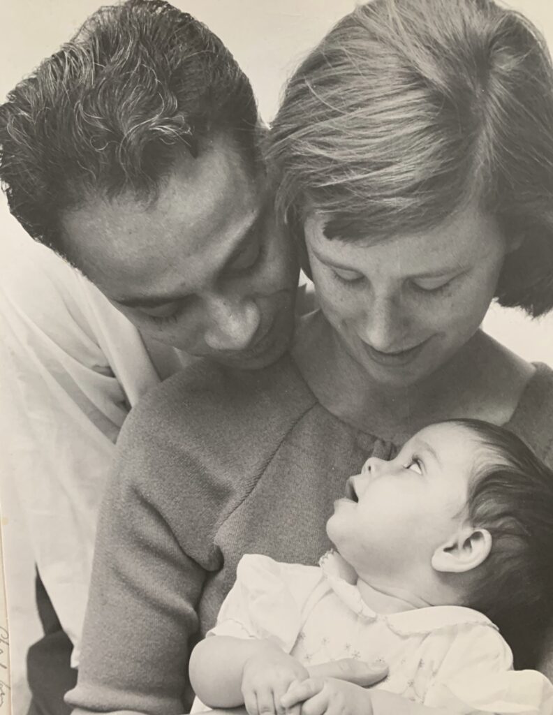 Lakhdhir as a child with her parents