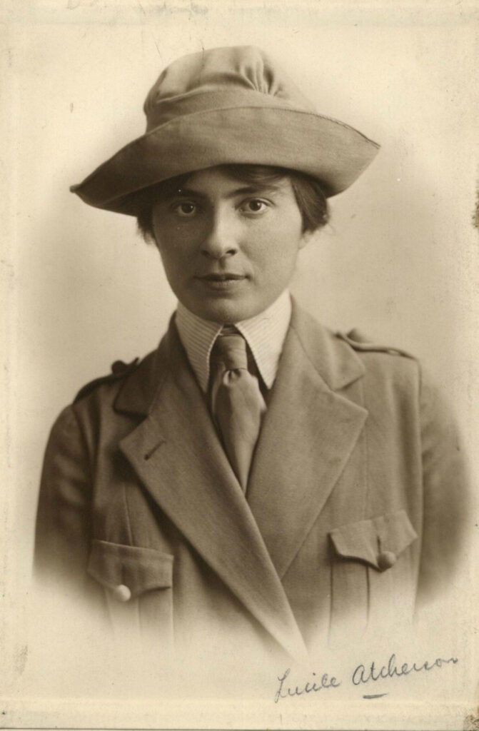 Portrait of a woman in a formal uniform.