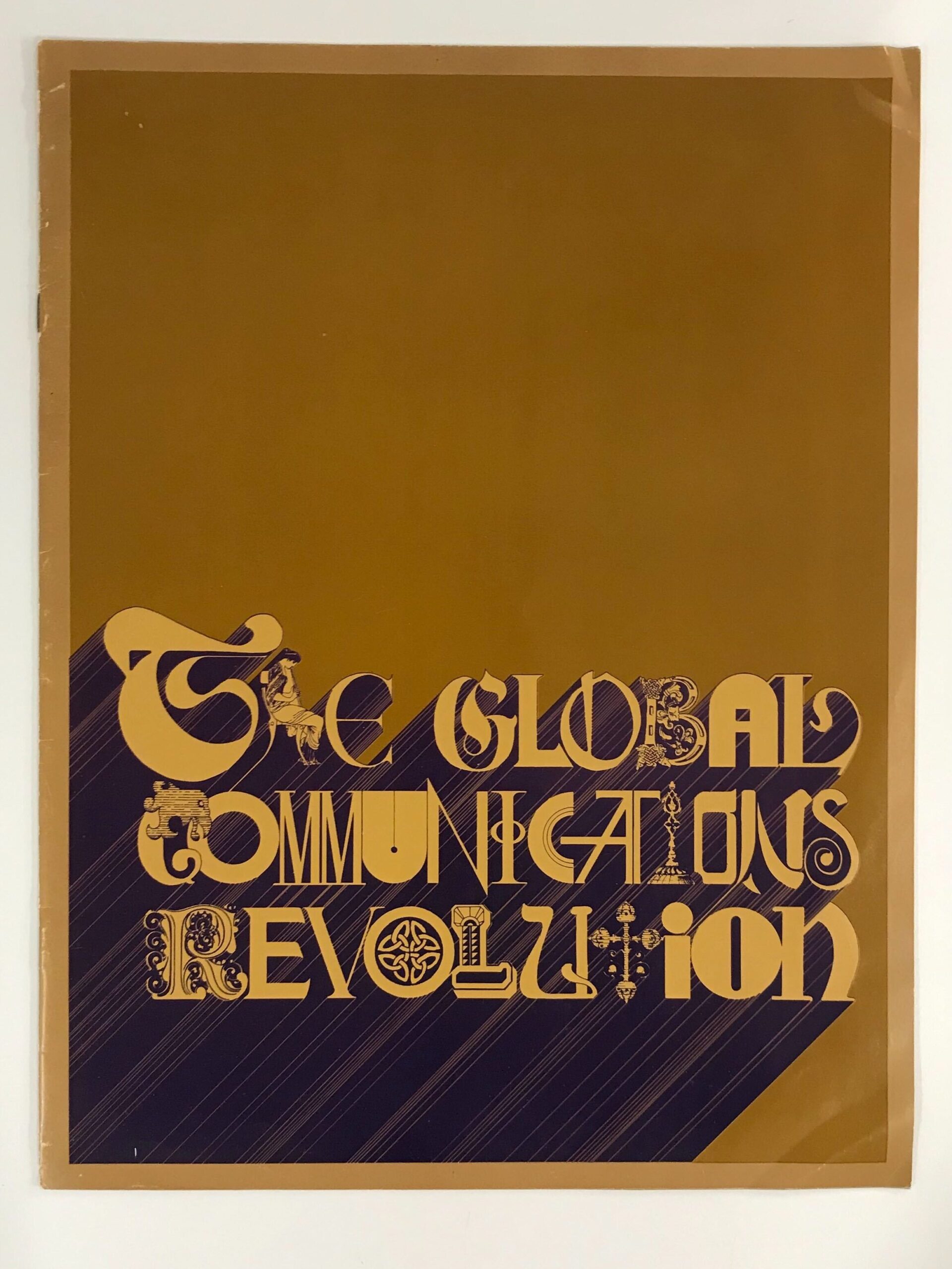 Amber and brown book color with uniquely ornate font spelling out "The Global Communications Revolution"