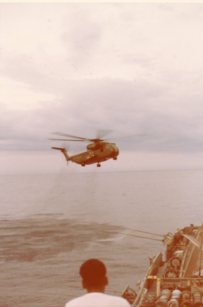 a marine helicopter over the ocean