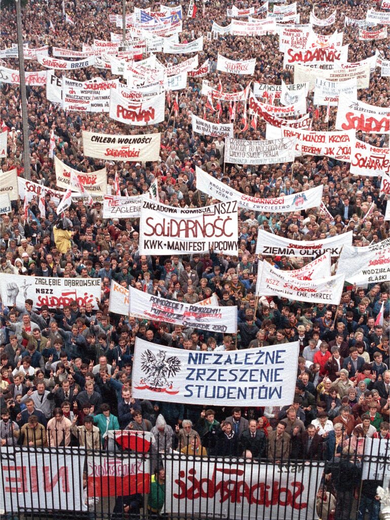 Pro-Solidarity banners are held aloft by the participants of a workers’ pilgrimage in southern Poland. Solidarity was a non-communist trade union promoting a broad social agenda and free elections. The slogans read: “Bread of Freedom - Solidarnosc (Solidarity)” or “Can We? We Can. Polish Perestroika.” September 18, 1988. AP photo.
