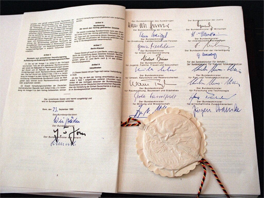 Richard Karl von Weizsäcker, President of the Federal Republic of Germany, signed the German Unification Treaty on the left side and signatures of the Federal Ministers appear on the right.