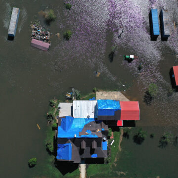 Aerial view of houses in hurricane damage