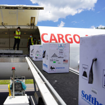 Supplies are loaded onto a cargo plane