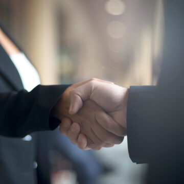 Two people shaking hands