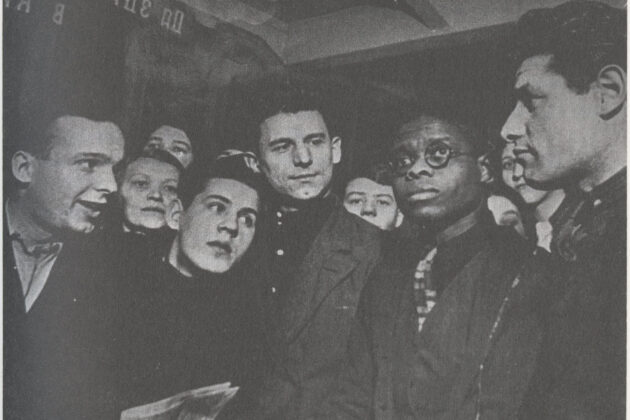 Robinson surrounded by his shop colleagues in Moscow