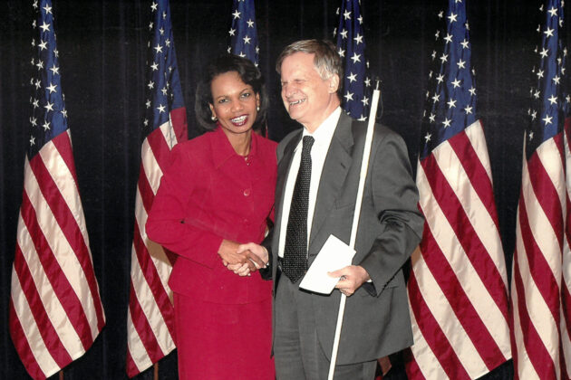 Condoleezza Rice shaking hands with Avraham Rabby