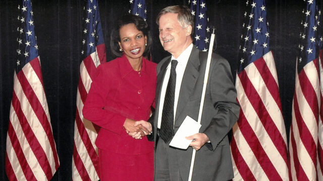 Condoleezza Rice shaking hands with Avraham Rabby