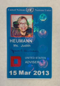 A rectangular blue ID card from the United Nations.