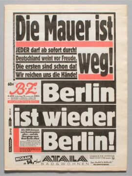 Headline in English: The Wall is down; Berlin is again Berlin.