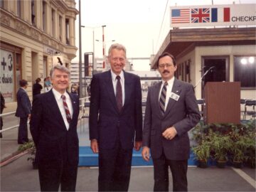 Attending the Decommissioning of Checkpoint Charlie, Berlin, were the U.S. Minister to West Berlin Harry Gilmore (left); U.S. Minister to East Berlin, J.D. Bindenagel (right), and West German Political Director Dieter Kastrup (center).