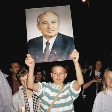 Many in East Germany, like this young man here carrying the photo of Mikhail Gorbachev in 1989, sought hope in the Soviet leader’s reforms.