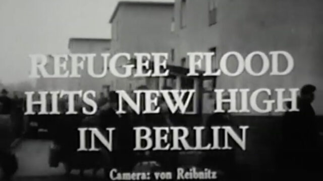 video frame that says refugee flood hits new high in berlin