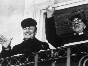 West German Chancellor Helmut Schmidt, left, smiles alongside East German General First Secretary Erich Honecker during their 1981 meeting in East Germany.