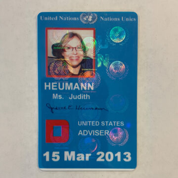 a blue ID card that says Heumann Judith