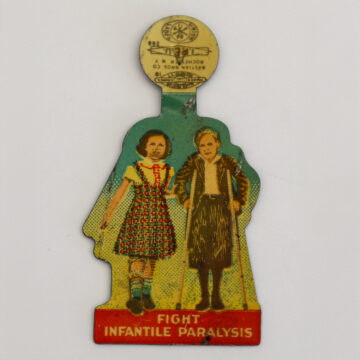 a pin that says fight infantile paralysis