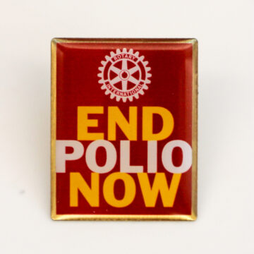 a pin that says end polio now