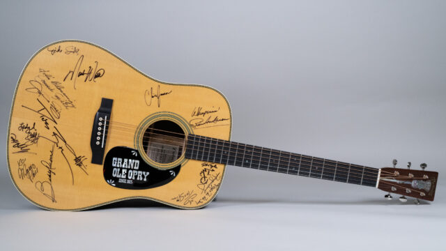 guitar with signatures including dolly parton