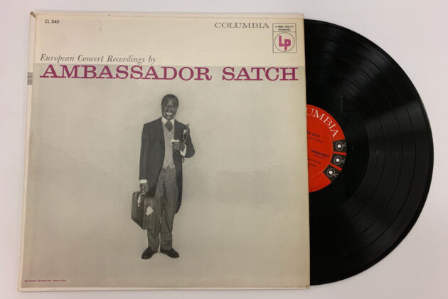 A vinyl record album that says Ambassador Satch