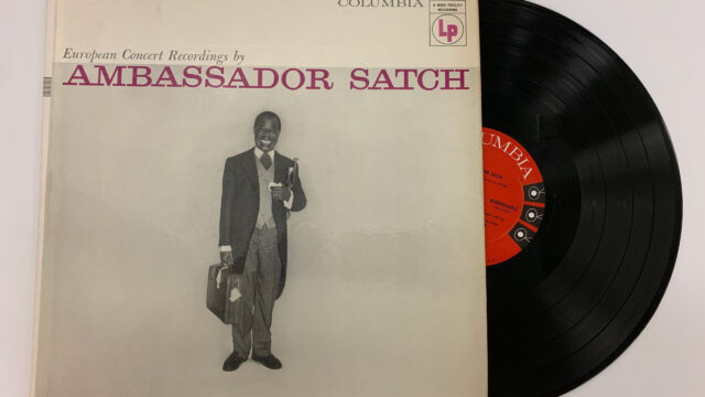 A vinyl record album that says Ambassador Satch