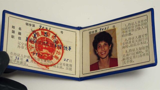 Bifold wallet showing Chinese-issued identification cards for Ruth Kurzbauer