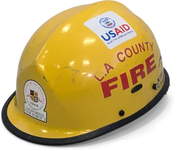 A yellow fire department helmet