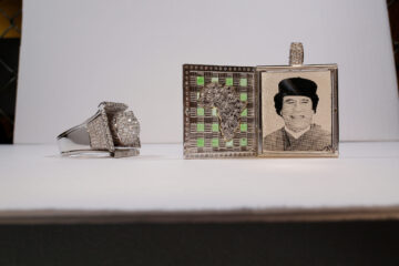 A ring and a locket with Qadhafi's face
