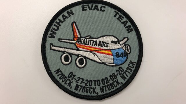 A patch that says Wuhan Evac Team