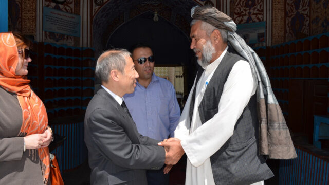 two men shaking hands