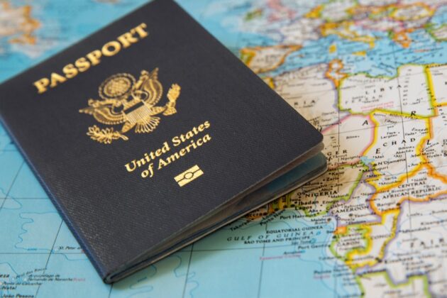 US passport on a background of a world map